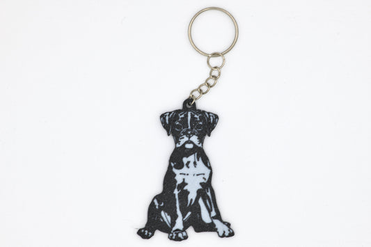 Keychain with a black and white Boxer silhouette dog design on a white background