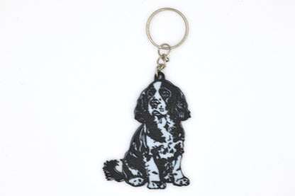 Keychain with a black and white Cocker Spaniel silhouette dog design on a white background